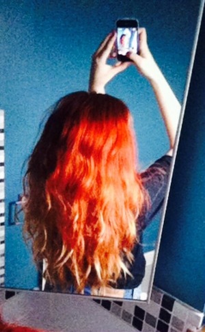 Hair had been previously bleached by an orangey dye, next time I dyed it I put my hair up in a high pony, and dyed the whole top of my head with LIVE XXL: Real Red, after a few washes it fades out beautifully😙