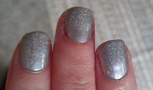 Christmas/NYE nails....I used China Glaze's "Platinim Silver" and Super Nail "Silver Rush" nail glitter.