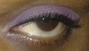 Purple eye shadow, with thin black eye liner 