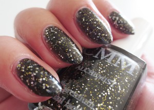 Color Me Monthly, a nail polish subscription, $7 per month. This month, for October, the shade is named Alchemist, a jelly black base with small and small silver hex glitters and mini gold glitters.
http://www.beautybykrystal.com/2013/10/color-me-monthly-october-alchemist.html