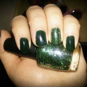 Green is my favorite color so I had to! I used OPI's nail color in "Fresh Frog of Bel Air" on my ring finger and Sinful Colors nail color in "Last Chance" on the other nails.
