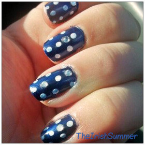 Navy basecoat with white dots. On each finger add a clear rhinestone in place of a dot, alternating locations for a subtle sparkle. 

navy color: NYC #115 "Skin Tight Denim"
white color: 