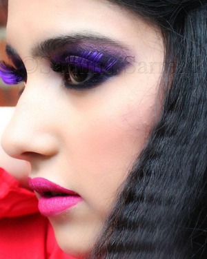 Hot Pink Lips, Strong Smokey Purple Eyes and Lashes and 80's Style Crimped Hair