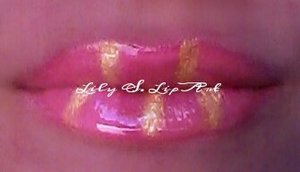 yellow stripes on pink lipstick to create a candy cane effect