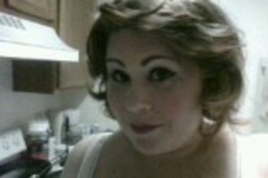 Grrr... It's blurry But This is my fiancee with her hair and makeup done. I was going for a 20's look almost pin up but it still turned out pretty I think.