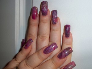 My own nails..I water marbled them.
