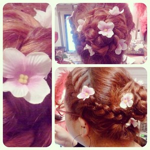Braided up-do with flowers my sister Leysha J made me today for my Grandpops cozy Summer wedding.