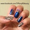 Electric blue and leopard nail art 