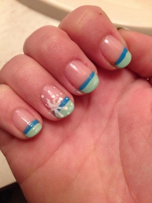 My wintery nail design I did on my cousin. I love this cute manicure. Snowflake and all!