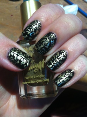 Rimmel London Lasting Finish in Black Cab, details painted in Barry M Gold Foil, topped with Seche Vite.