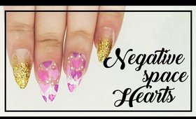 Negative Space Hearts nail art