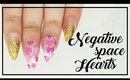 Negative Space Hearts nail art