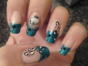 Hello kitty decal and like-color diamonds on natural nails