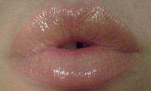 nude lipstick under sheer lip gloss.