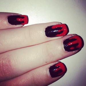 This year's Halloween nails

Base coat: Onyx black, Maybelline NY 
Blood drips: Hot coral, GOSH 

Blog post:
http://nailarttart.blogspot.co.uk/2012/10/h-l-l-o-w-e-e-n-w-e-e-k-e-n-d.html