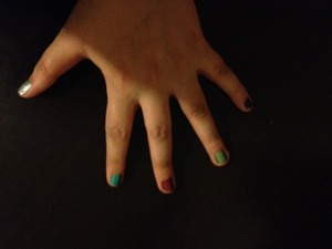 I didn't know what to color of nail polish to use so I did my nails colorful. 