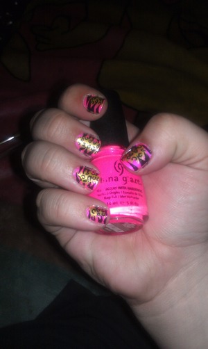 Hot pink based with gold gel pen and black leopard spots and zebra stripes, done with gel pen!