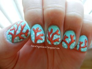 http://thecateyeshaveit.blogspot.com/2012/07/coral-nails-literally.html