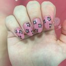 Pink and purple floral nail art