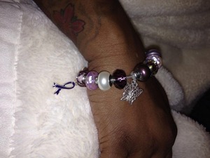 Designed by Kayde Designs 
KaydeDesigns@live.com 
Designed with Swaroski Crystals and Elements Gemstones Sterling Silver 18kt and 22kt Vermeil ,pewter charms beads and accessories 
Contact for custom orders 
This was Designed for A makeup artist with Lupus 
