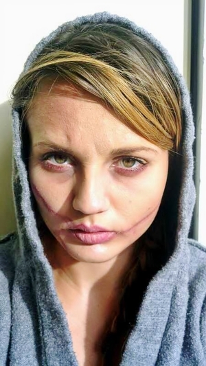 Scarred effect using Rigid Collodion, lipstick, and eyeshadow.