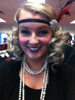 Pin curls, big lashes, dark lips, pearls, and even a teeny mole :) loving Cosmo school!