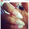 stiletto nails with white French hearts 