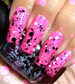 I love this look it reminds me of paint splatter I used china glazes pink voltage and ninja polishs sticks n stones my top coat of choice is Seche Vite 