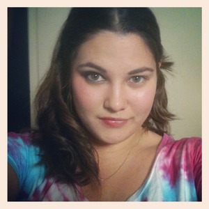 Curled hair, made up eyes