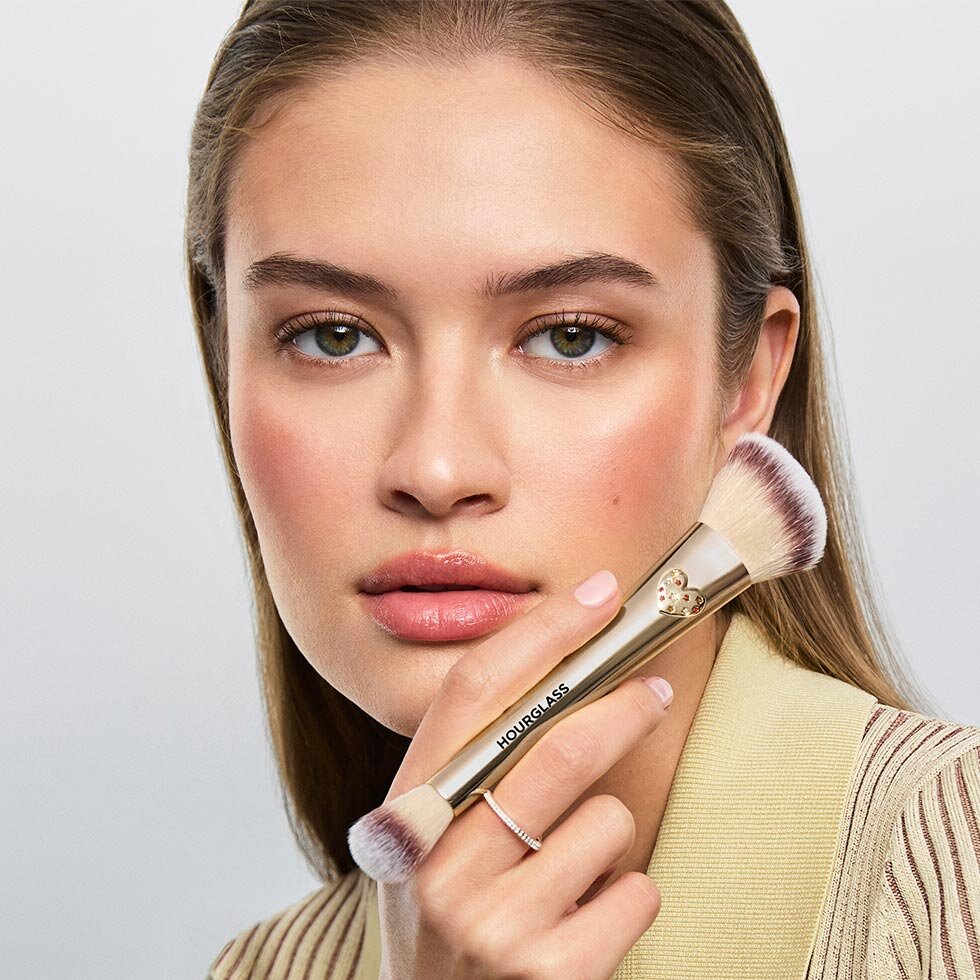 Hourglass model holding the Ambient Lighting Edit Brush II - Love