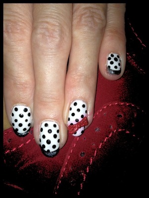 Black & white French with polka dots and hand sculpted bow detail