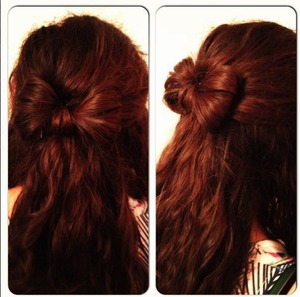 Bow hairstyle that I did on my sister.