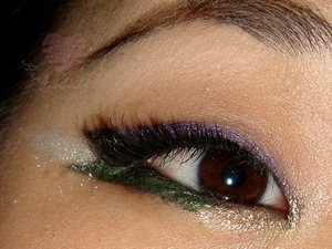 I saw this look in one of my chinese beauty magazines and had to mimic it =)

I mainly used cream liners and maybelline color tattoo.. the brown and green are green cream liners by Dalton Cosmetics