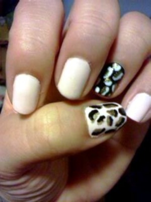 sinful colors in easy going,  a black nail polish, a white nail Polish and a gold nail Polish 