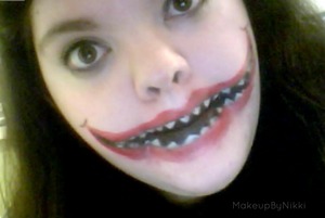 I was originally going to do a cheshire cat mouth, but ended taking the scary route. Very easy and fun look to do, would be great for an evil clown look.