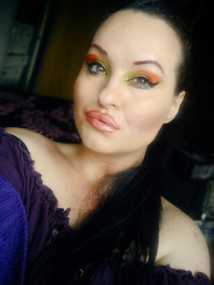 120 pallete make up..  aorange ,yellow and blue eyeshadow look. sexy mother pucker lipgloss,loreal infalliable foundation
