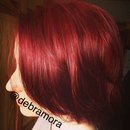 Bright red bobbed hair 