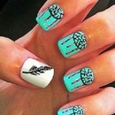 Feather & blue nails 