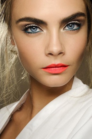 I love the idea of the brightly coloured lips. Cara is so beautiful. 