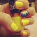 yellow and blue beautiful nails