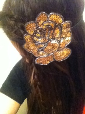 My hair straightened and French braided. I added a headband with a golden sparkly flower. 