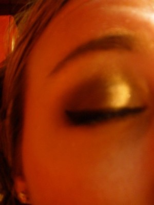 Dark brown, gold smokey eye. Crappy quality picture.