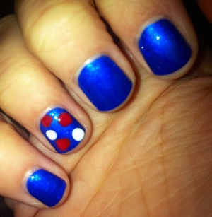 Election-themed nails. My first attempt at polka dots. Obviously, I need more practice! (colors used: Wet N Wild Fast Dry in Saved By The Blue, Sparitual Hunk of Burnin' Love & PeaceKeeper Paint Me Tender)