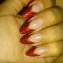 Red glitter stiletto nails