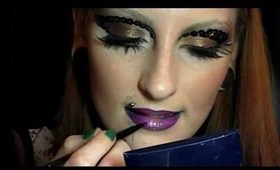 Stylized bronzed look with purple lips . Steampunk for runway. Make-up look