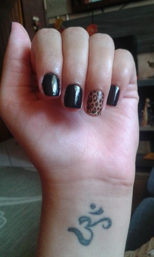 Animal nail with sepia black of Risque. 