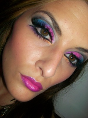 Cut crease colorful look-pimented blue, pink, & orange shadows. Two toned lip!