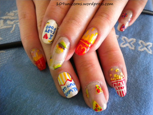 Nails inspired by fast food!! With pizza, popcorn, french fries, burgers and donuts!