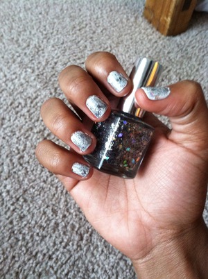 nail polish is pure ice:) I put a white coat under the glitter and diamonds:) hope u enjoy