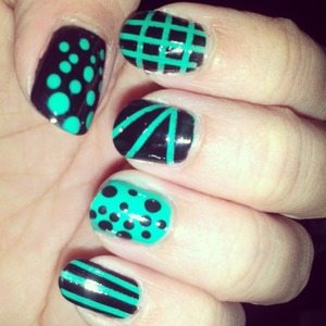 i made this style with green polish first and then black poish... i used dottings and striping tape to make the lines